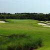 A view of a green protected by bunkers at Bella Collina Golf Club