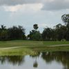 A view over the water of green #8 at Hibiscus Golf Club