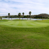 A view of the 18th green with water in background at EastWood Golf Course