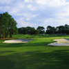 A view of green protected by bunkers at Lansbrook Golf Club