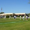 A view of the clubhouse and practice area at Serenoa Golf Club