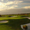 A view of the 2nd green protected by bunkers at Orange County National - Panther Lake Course