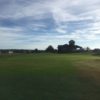 A view of a hole and the clubhouse in background at Rivard Golf & Country Club.