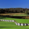 A sunny day view of a green from the Golf Club of Amelia Island at Summer Beach.