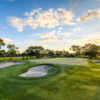 A sunny day view of a green at Turtle Creek Club.