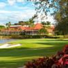 A view of a green and the clubhouse in the distance at LaPlaya Beach & Golf Resort.