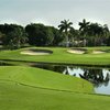 A view of green protected by bunkers at Boca Greens Country Club