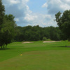 A sunny day view from a tee at River Ridge Golf Club.