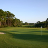 A view of the 8th green with a pond on the right side at St. James Bay Golf Club.