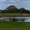 A view of a green with bunkers and water coming into play at IMG Academy Golf Club.