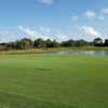 A view of a green with water coming into play at Indian River Preserve Golf Club.