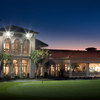 A view of the clubhouse and putting green at Avila Golf & Country Club