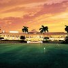 A view of the clubhouse and putting green at Doral Golf Resort & Spa