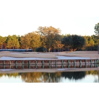 A pond frames the left side of the 18th at Eagle Landing at Oakleaf Plantation.