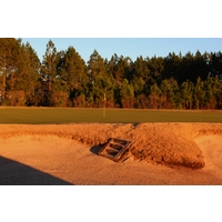 The bunker guarding the 17th green at Eagle Landing at Oakleaf Plantation is so deep it requires steps. 